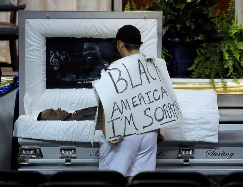 Mourners pay their respects to Alton Sterling during his visitation and funeral on the Southern University campus in Baton Rouge, La., on July 15, 2016. (Credit: David Grunfeld, NOLA.com | the Times-Picayune)
